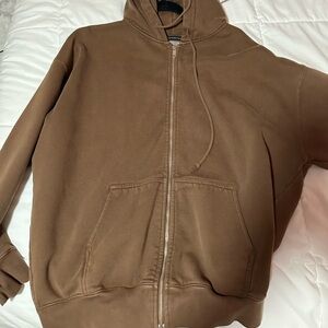 Brandy Melville Brown Christy Hoodie. It’s the oversized one